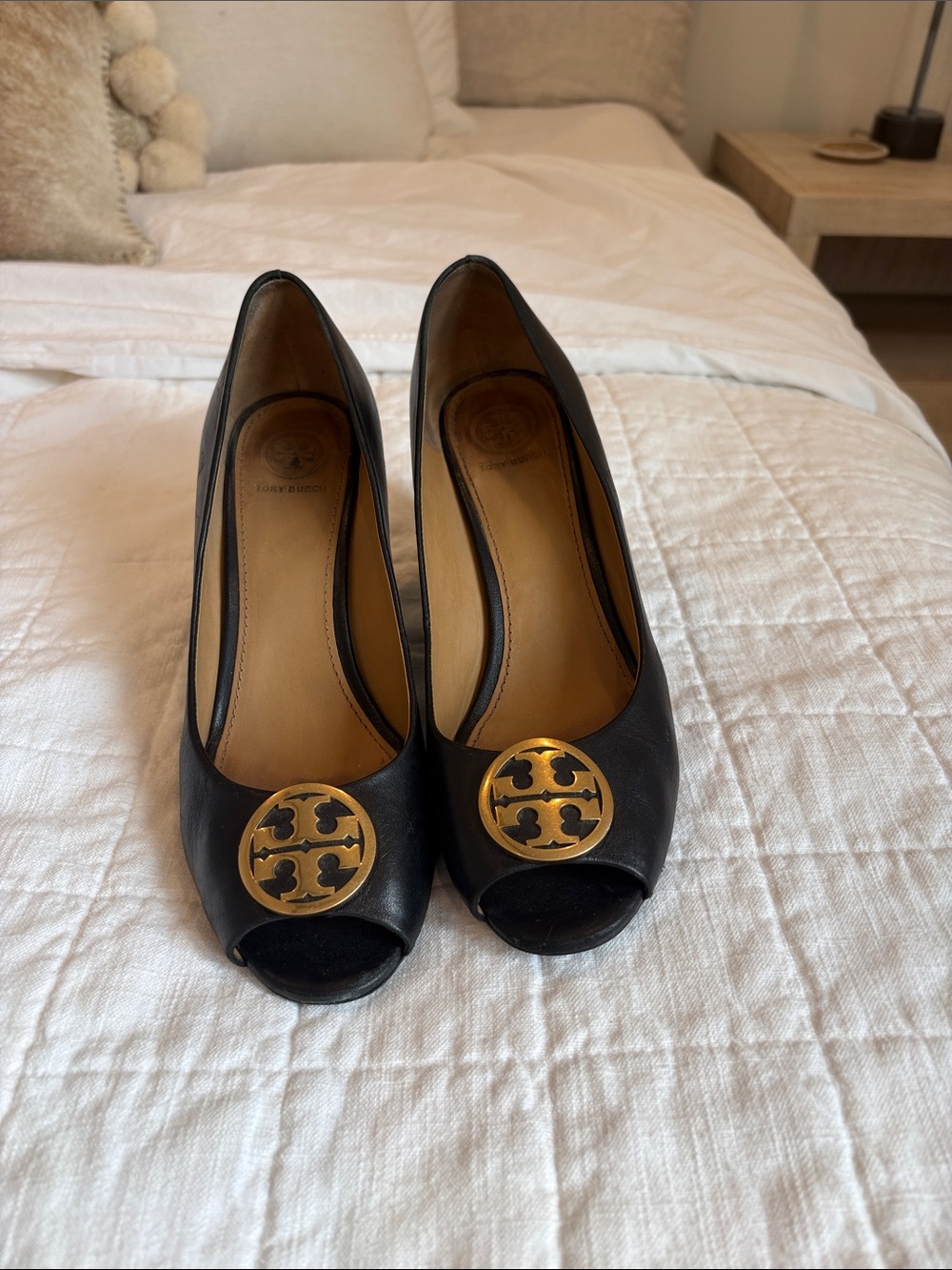 Tory Burch Black Peep-Toe Pumps with Gold Logo Medallion